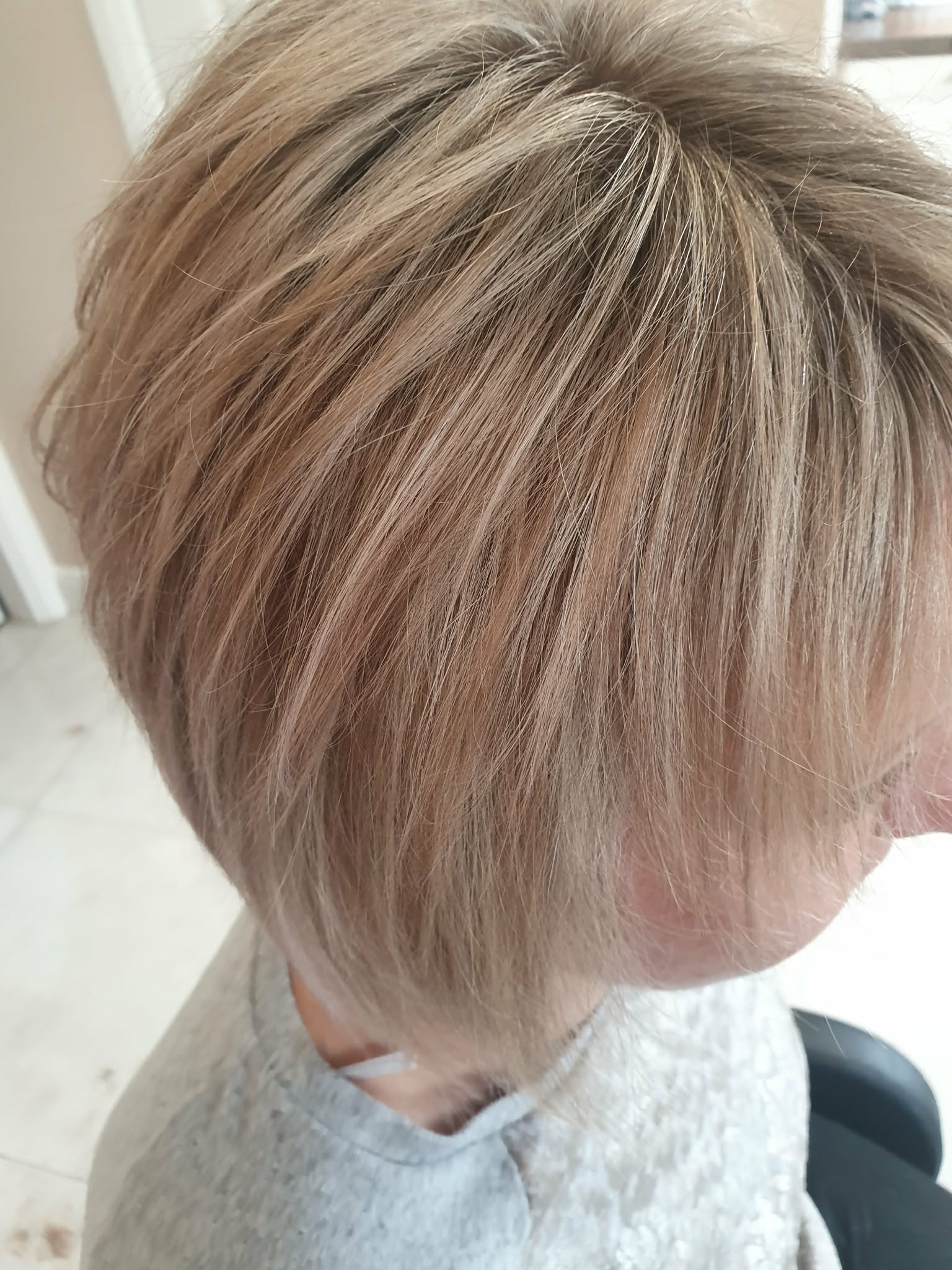 The same hair after colouring and styling